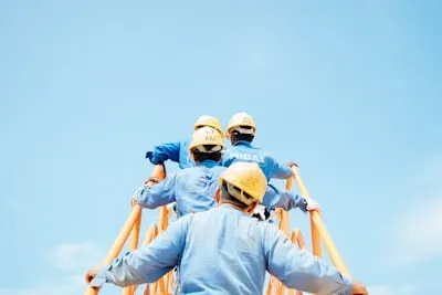 Team of workers on scaffolding